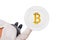 Icon of virtual electronic money bitcoin served on empty plate. Top view of a waitress in a white blouse on the white background