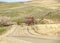 Iconic barn in Idaho and winding road