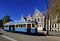 An iconic Christchurch tramway running in front of the University of Canterbury building