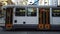 Iconic city trams traveling across Swanston Street