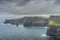 Iconic Cliffs of Moher with OBriens Tower on far distance, Ireland