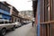 Iconic and colorful old houses and narrow streets typical of El Hatillo, where few people can be seen walking down the street