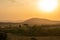 Iconic dusk orange sunset scene in the Masaai Mara reserve in Kenya Africa