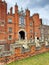 Iconic entrance view of Henry 8th& x27;s Hampton Court Palace with bridge over moat