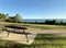 An iconic Gold Coast surfboard bench overlooking an Australian Gold Coast beach