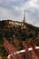 Iconic Hollywood sign perched atop a lush green hillside in sunny California.