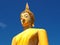 Iconic image of Lord Buddha draped in yellow robe