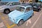 Iconic italian car Fiat 500 in turquoise blue color view