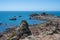 The iconic La Corbiere lighthouse on the headland of St Brelade, Jersey, Channel Islands, British Isles