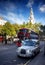 Iconic London taxi and red bus at London street in London Street