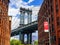 Iconic Manhattan Bridge and Empire State Building view from Washington Street in Brooklyn, New York