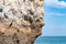 The iconic natural rock formation called The face in Praia da Marinha in Algarve, Portugal, Europe view from popular boat cave