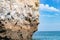 The iconic natural rock formation called The face in Praia da Marinha in Algarve, Portugal, Europe view from popular boat cave