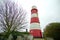 Iconic red and white Happisburgh lighthouse.