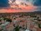 Iconic scenery over the old historical town of Areopoli Lakonia  Greece against a dramatic sunset sky