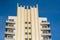Iconic tops of Miami Beach historic deco hotels on blue sky