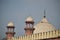 iconic view of the emperor mosque and dome from food street, badshahi mosque, selective focus