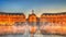 Iconic view of Place de la Bourse with tram and water mirror fountain in Bordeaux, France