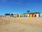Iconic wooden beach huts on Brighton beach, Melbourne in summer beautiful day with blue sky.