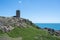 The iconic WW2 La Corbiere watchtower on the headland of St Brelade, Jersey, Channel Islands, British Isles