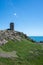 The iconic WW2 La Corbiere watchtower on the headland of St Brelade, Jersey, Channel Islands, British Isles