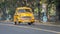 Iconic yellow Indian taxi in Calcutta Kolkata, West Bengal, India