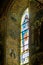 Icons and image of Orthodox saint on the stained glass window of the Cathedral