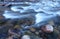 Icy cold water flows down the Poudre River on a chilly morning