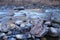 Icy cold water flows down the Poudre River on a chilly morning