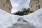 Icy path between two residential buildings