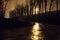 Icy road in the light of lanterns evening