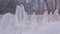 Icy sculpture of frozen penguins in winter city. Ice Sculptures in Russia. Sculptures In The Ice town. Ice Sculpture and