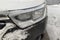 Icy and snowy car headlight. Car front lamp in winter