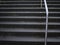 Icy stairway with metal banister