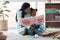 Id love to see the world through a childs eyes. a woman reading a book to her daughter while sitting at home.