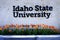 Idaho State University Sign with Flowers in Garden Education College