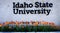 Idaho State University Sign with Flowers in Garden Education College