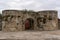 Idanha a velha castle wall entrance gate on a cloudy day, in Portugal