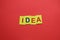 Idea. The inscription on the yellow tags on a red background