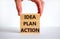 Idea, plan, action symbol. Wooden blocks form the words `Idea, plan, action` on beautiful white background. Businessman hand.