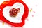 Idea for Valentine treats pretzel dip chocolate in ceramic heart shape plate on white background with copy space