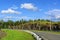 Ideal country motorway in rocky forest in summer