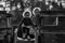 Identical twin girls on slide on playground