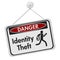 Identity theft danger sign on white