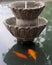 Idle fountain and golden fishes