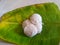 Idli made plain rice on banana leaf. Healthy breakfast .