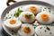 Idli, sambar, coconut and lime chutney, south indian breakfast on banana leaf