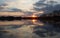 Idylic scene - sunset - lake with mirrored clouds