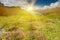 Idyllic Alpine scene in sun rays