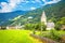 Idyllic alpine village of Burgeis and Abbey of Monte Maria view